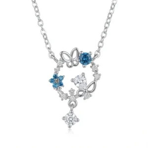 Sterling silver butterfly and floral pendant necklace with blue and clear gemstones, front view