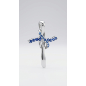 Sterling silver cross pendant with blue gemstones, front view