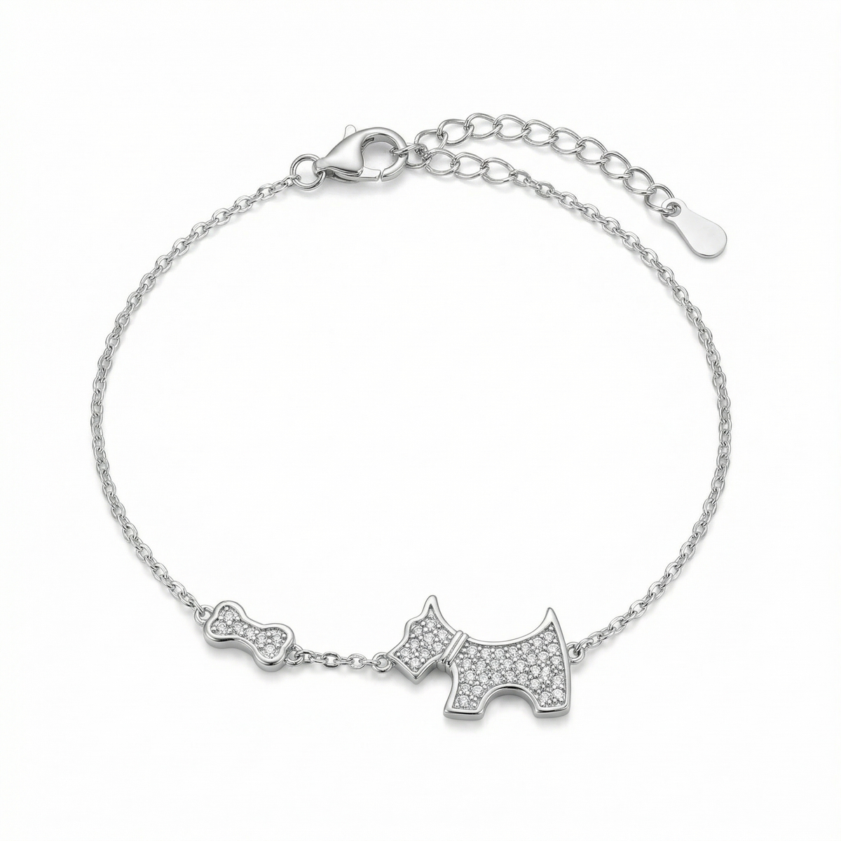 Sterling silver bracelet with dog and bone charms, featuring cubic zirconia, top view