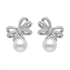 Sterling silver bow earrings with pearls, front view