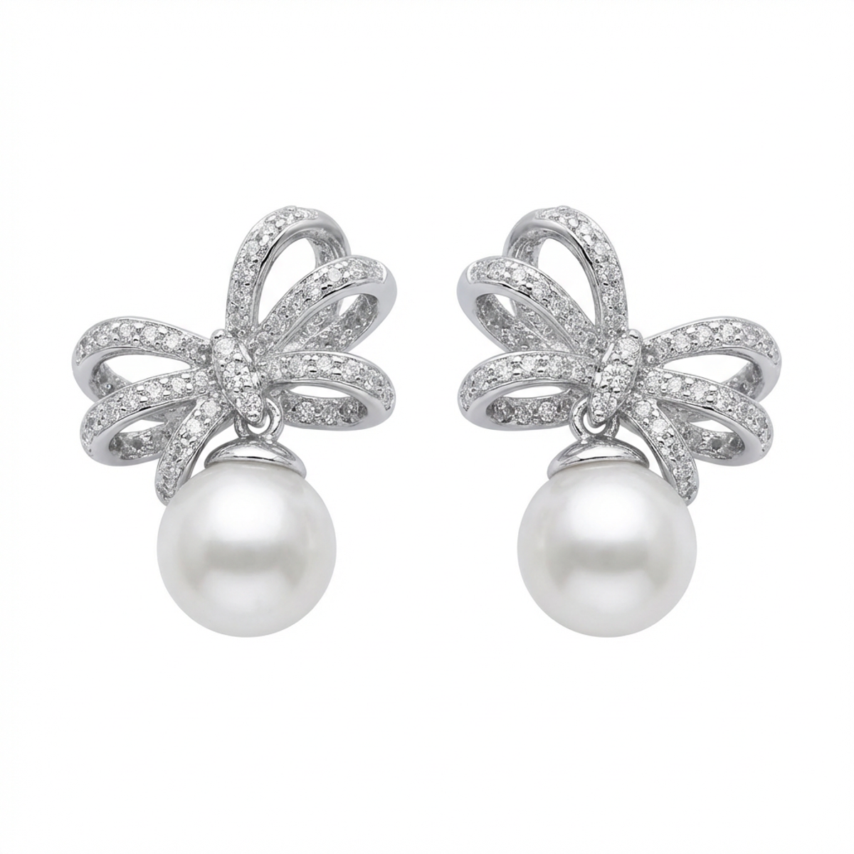 Sterling silver bow earrings with pearls, front view