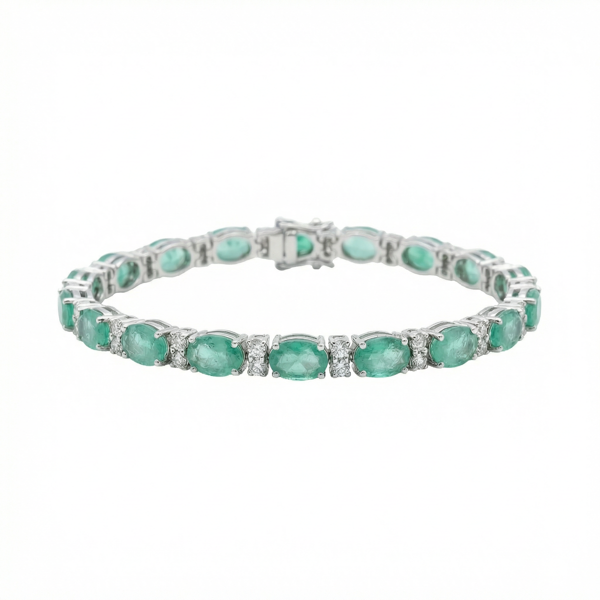 Sterling silver tennis bracelet with emerald stones, front view