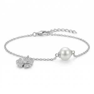 Sterling silver bracelet with clover charm and pearl, side view