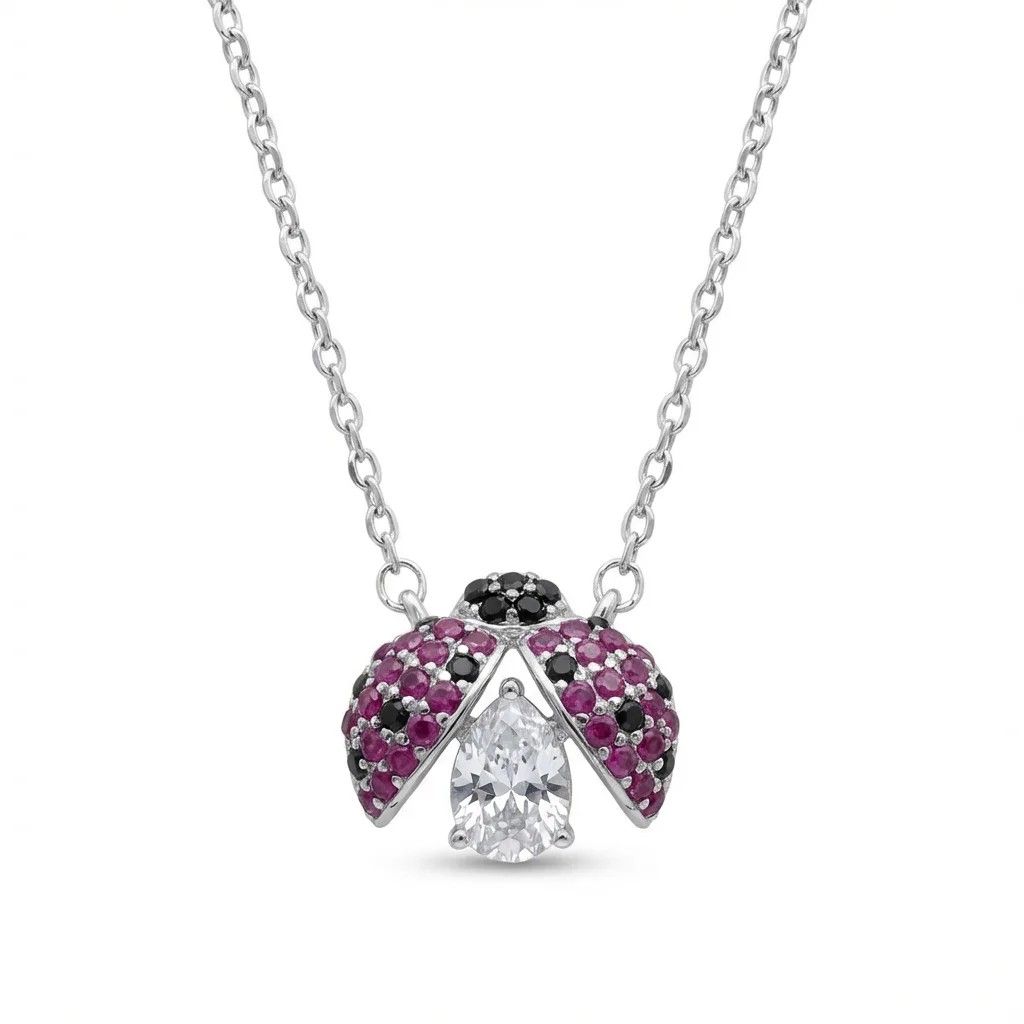 Sterling silver ladybug pendant with gemstones, front view