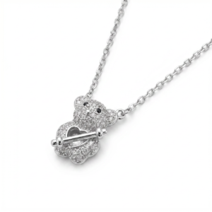 Sterling silver teddy bear pendant on chain, front view