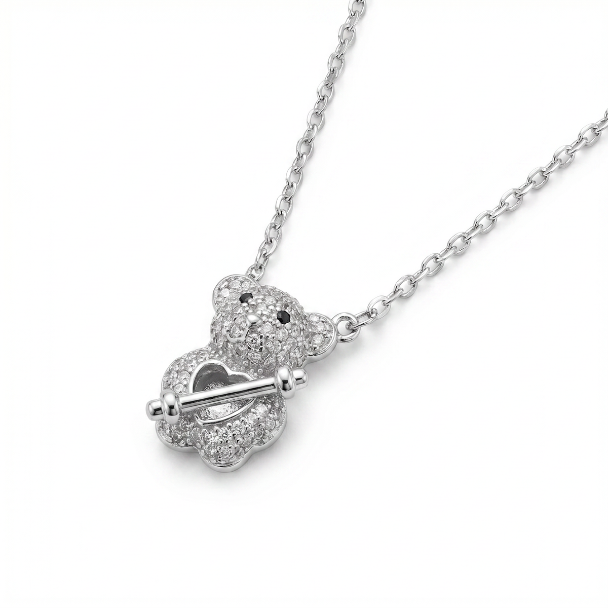 Sterling silver teddy bear pendant on chain, front view
