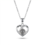 Sterling silver heart pendant necklace with black stone, front view