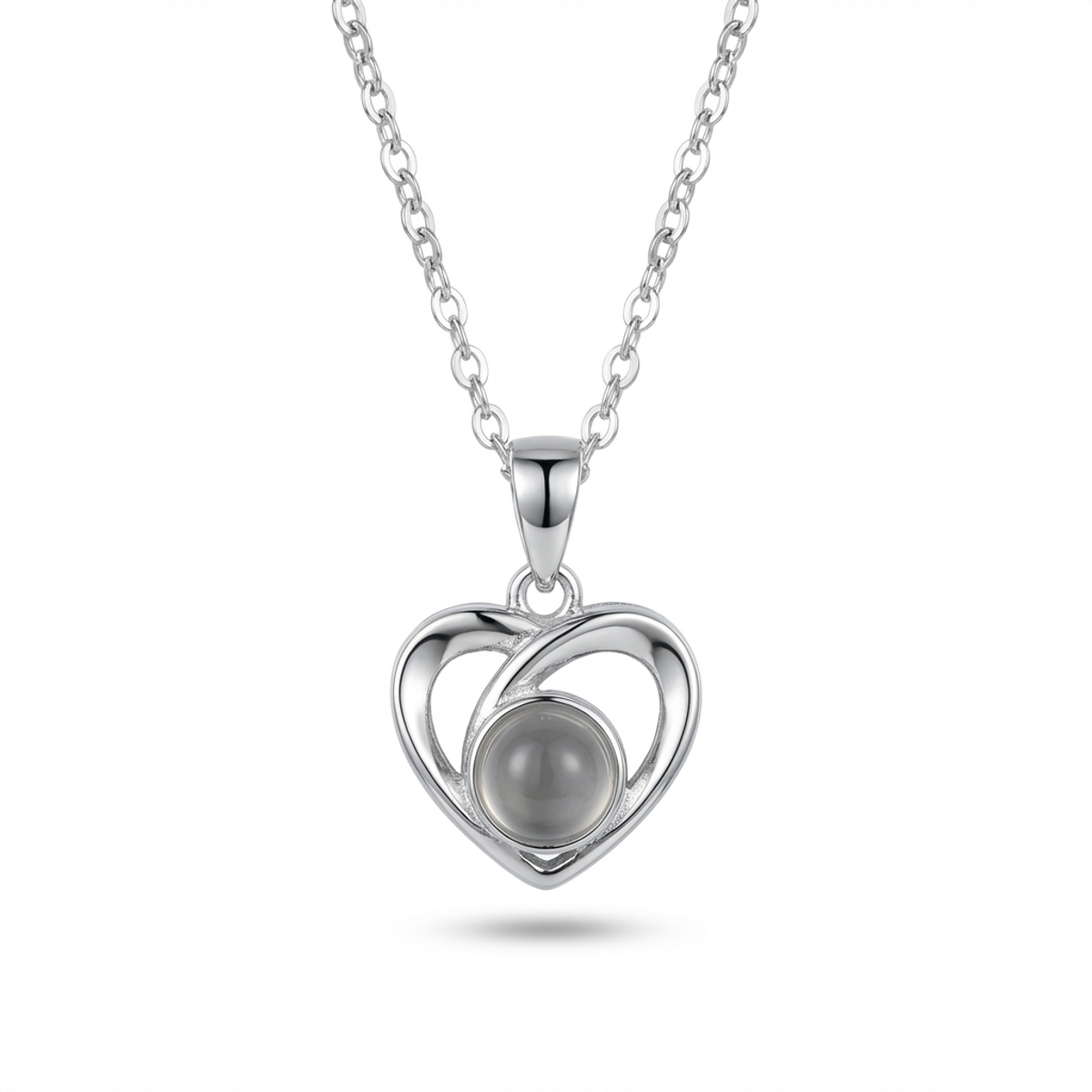 Sterling silver heart pendant necklace with black stone, front view