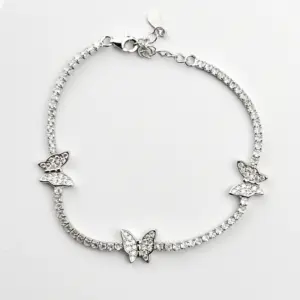 Sterling silver butterfly tennis bracelet with clasp, top view