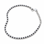 Sterling silver tennis bracelet with black and white cubic zirconia, top view