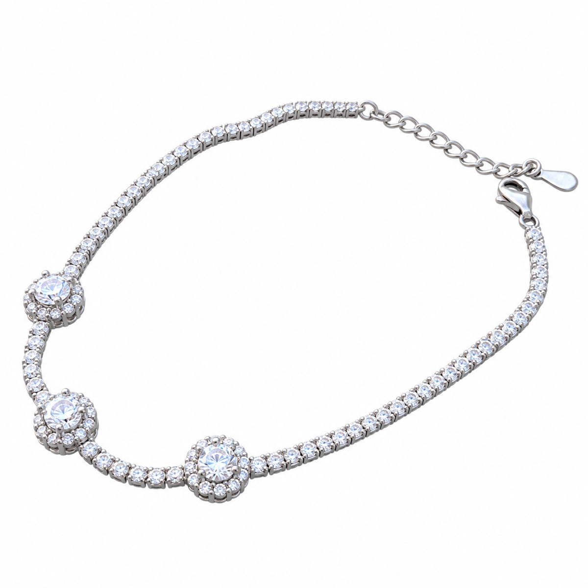 Sterling silver tennis bracelet with triple halo clusters, top view
