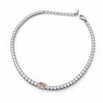 Sterling silver tennis bracelet with cubic zirconia and orange gemstone, top view