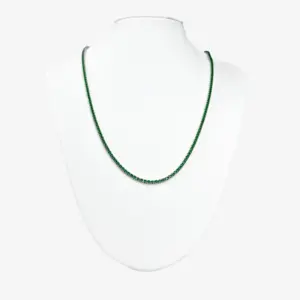 Sterling silver necklace with emerald stones, front view