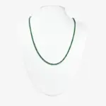 Sterling silver necklace with emerald stones, front view